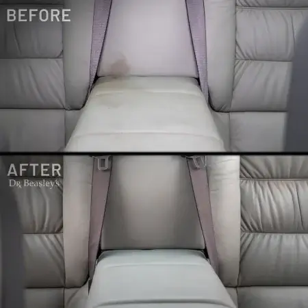 Comparison image: Grey leather interior before and after using Fine Leather Prescription. Before image shows leather with a dark stain, while after image shows leather restored without the stain.