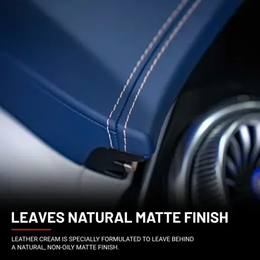 Navy-colored leather dash with beige stitching conditioned after using Leather Cream.