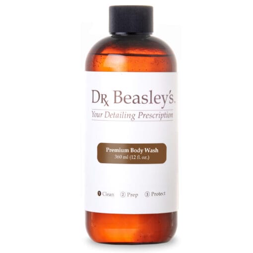 Glass bottle of Dr. Beasley's Premium Body Wash on a white background.