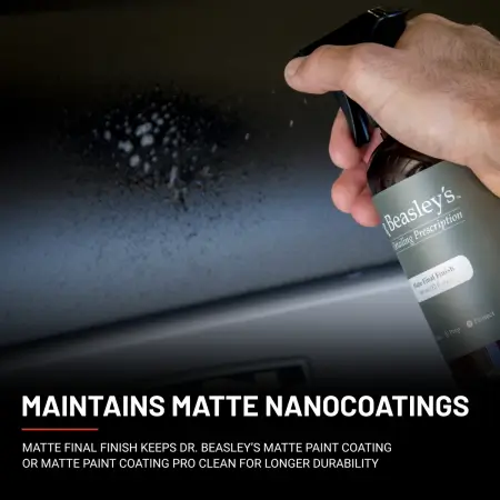 12 oz bottle of Matte Final Finish being sprayed onto matte black car hood.