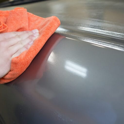 Wiping off Carnauba Mist Spray On Wax