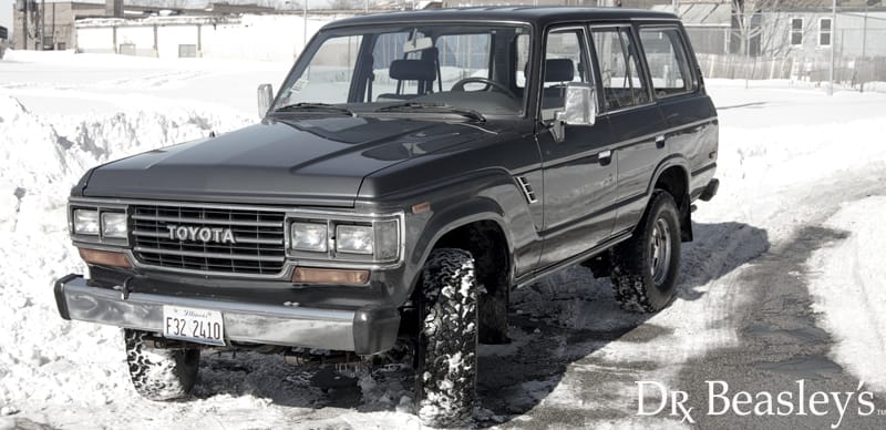 Land Cruiser Driving Through Snow