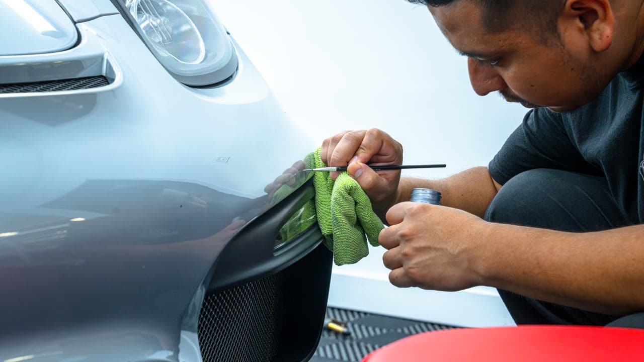 Touching up paint on a Porsche 911
