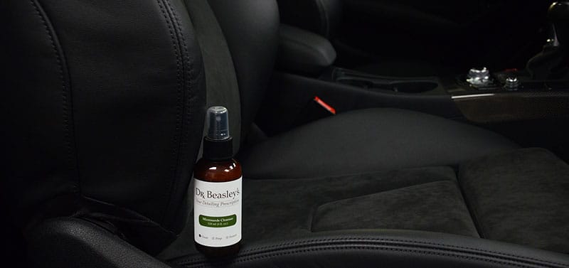 Alcantara fabric with Dr. Beasley's Microsuede Cleanser bottle