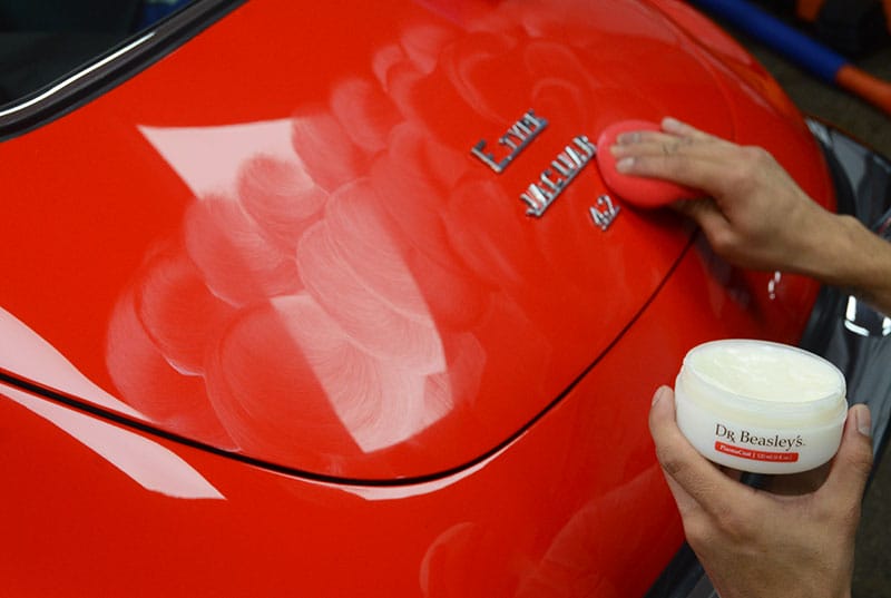 Application of instant bonding paint sealant on 1969 E-Type Jaguar