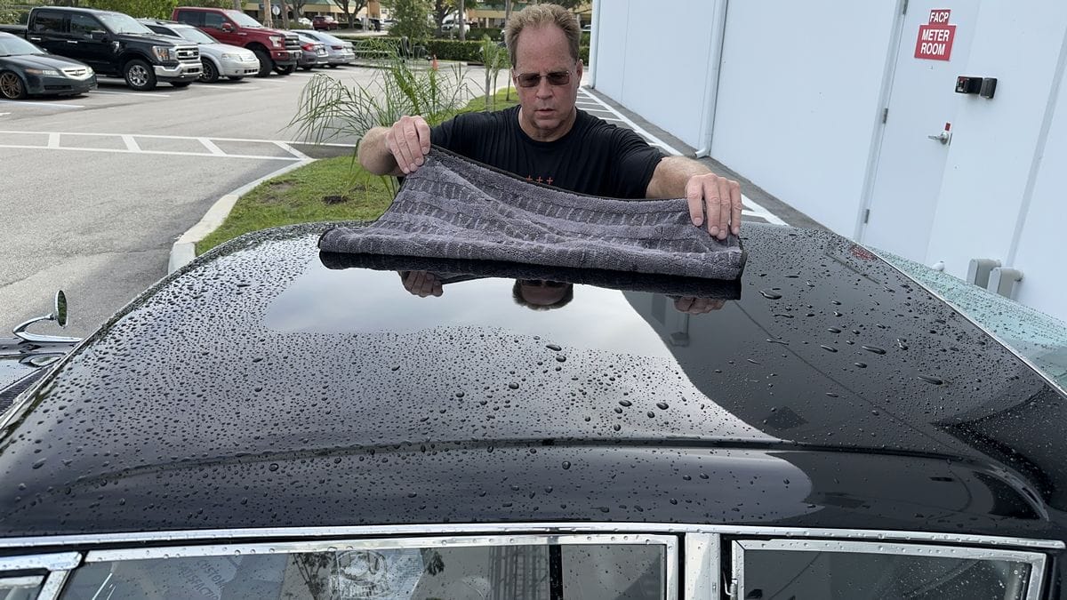 Drying black car