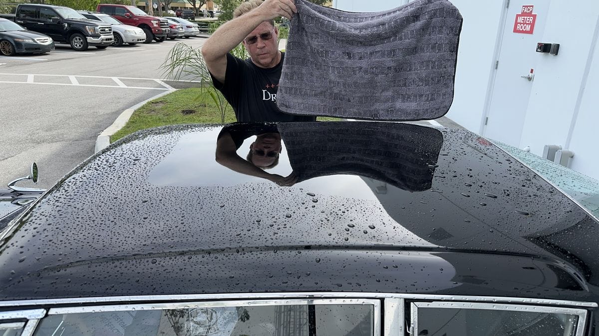 Drying black car