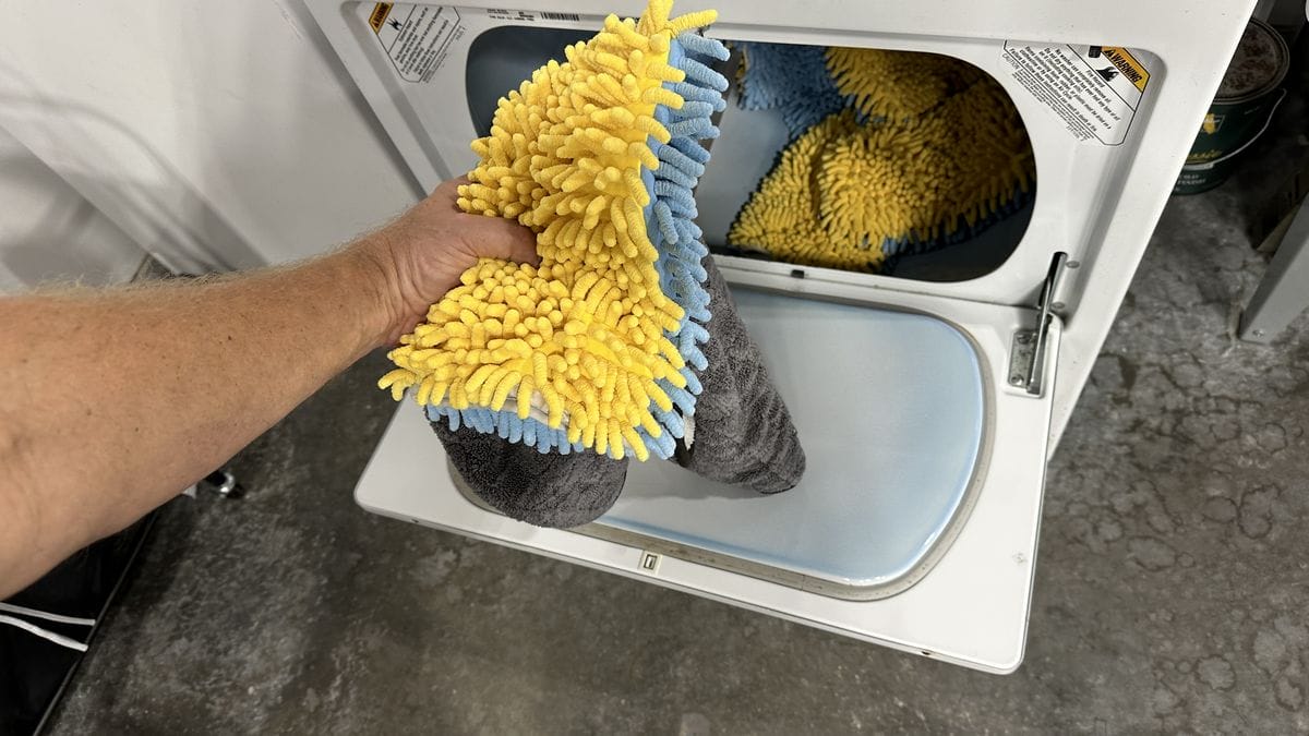 Putting wash mitts into dryer