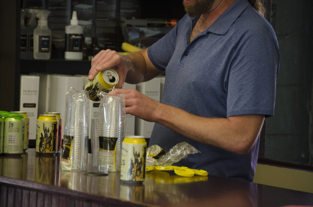 Haymarket's John Neurauter pours some Speakerswagon Pils