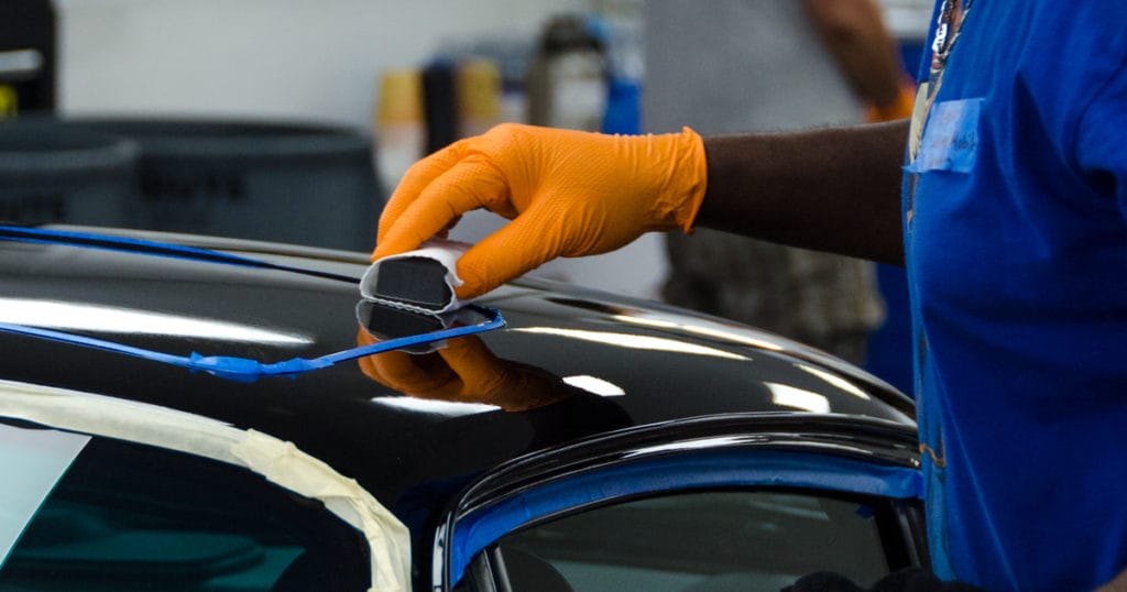 Reese from A-Game Mobile Detailing applying Dr. Beasley's Nano-Resin. 