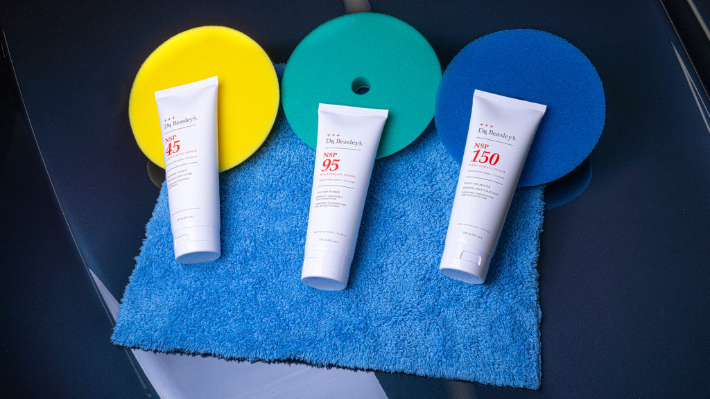 Dr. Beasley's Nano Surface Primers laying on a hood.