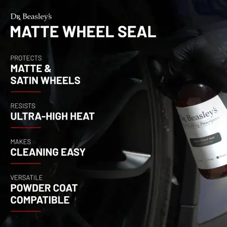 Matte Wheel Seal 12 oz bottle spraying onto a matte black wheel.