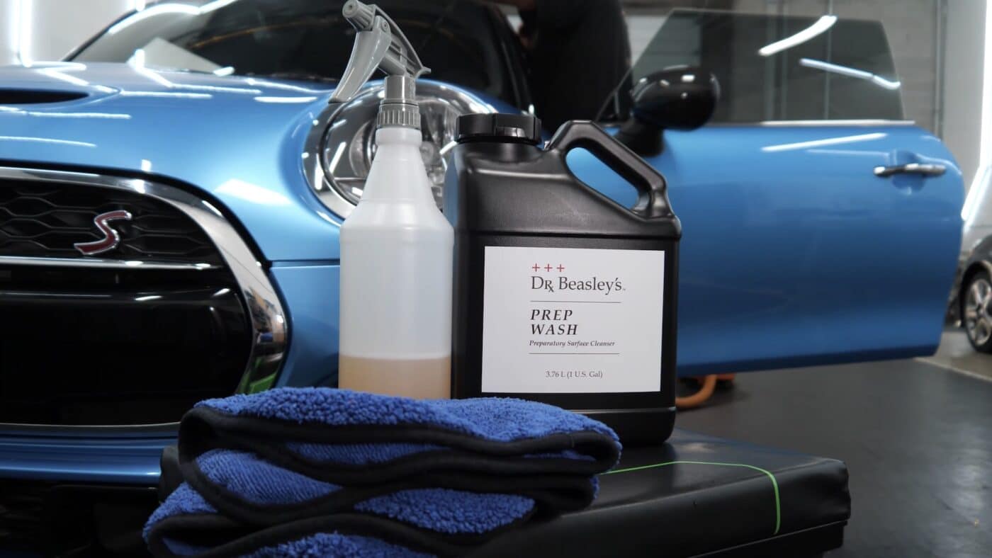 Dr. Beasley's Prep Wash in front of a blue Mini