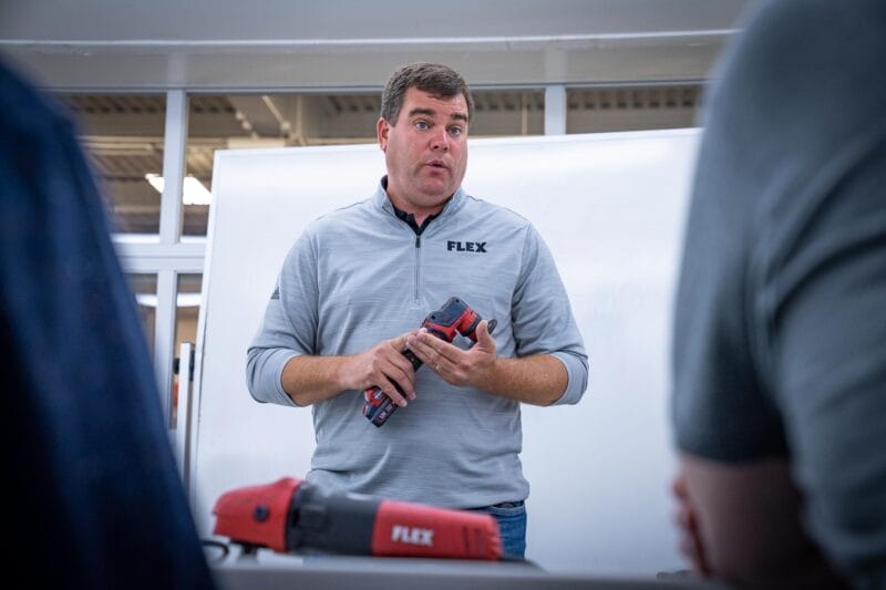 Chris Metcalf with FLEX tools presenting FLEX's range of orbitals.