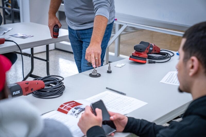 Chris Metcalf pointing out a specific part from a FLEX orbital.