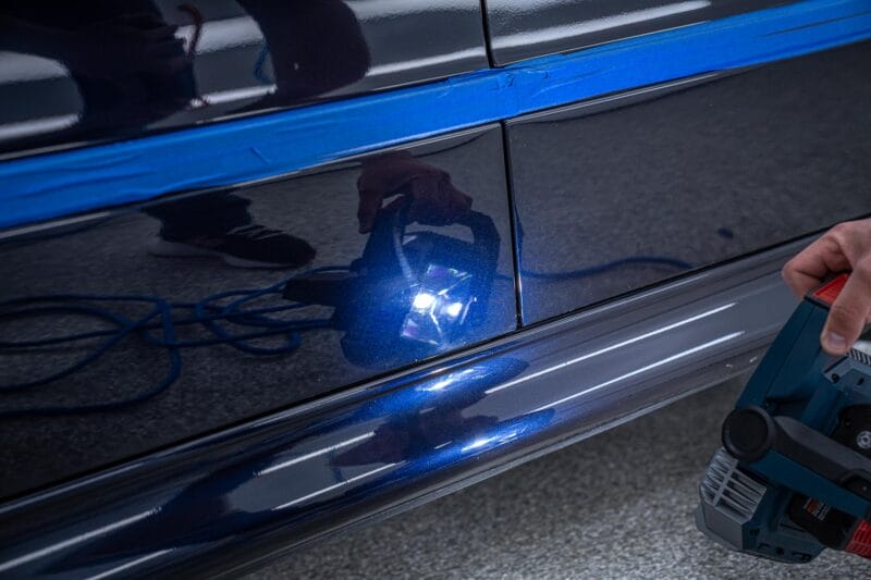 Inspection light being used during paint correction of E39 M5.