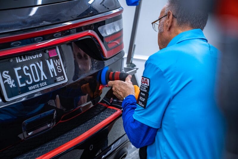 Rear tailgate of Dodge Durango being paint corrected during Dr. Beasley's Future of Detailing Clinic.