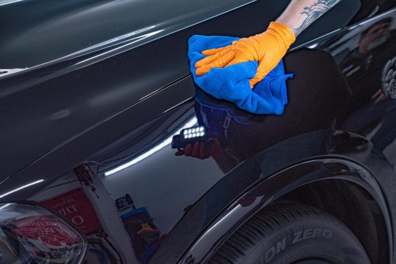 Final inspections on a Dodge Durango after being paint corrected.