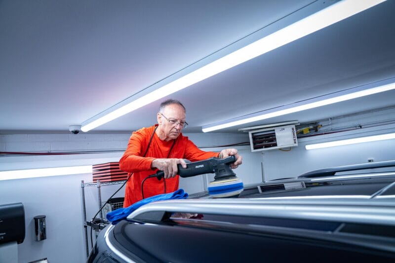 Rupes orbital being used on the roof of a Mercedes SUV.