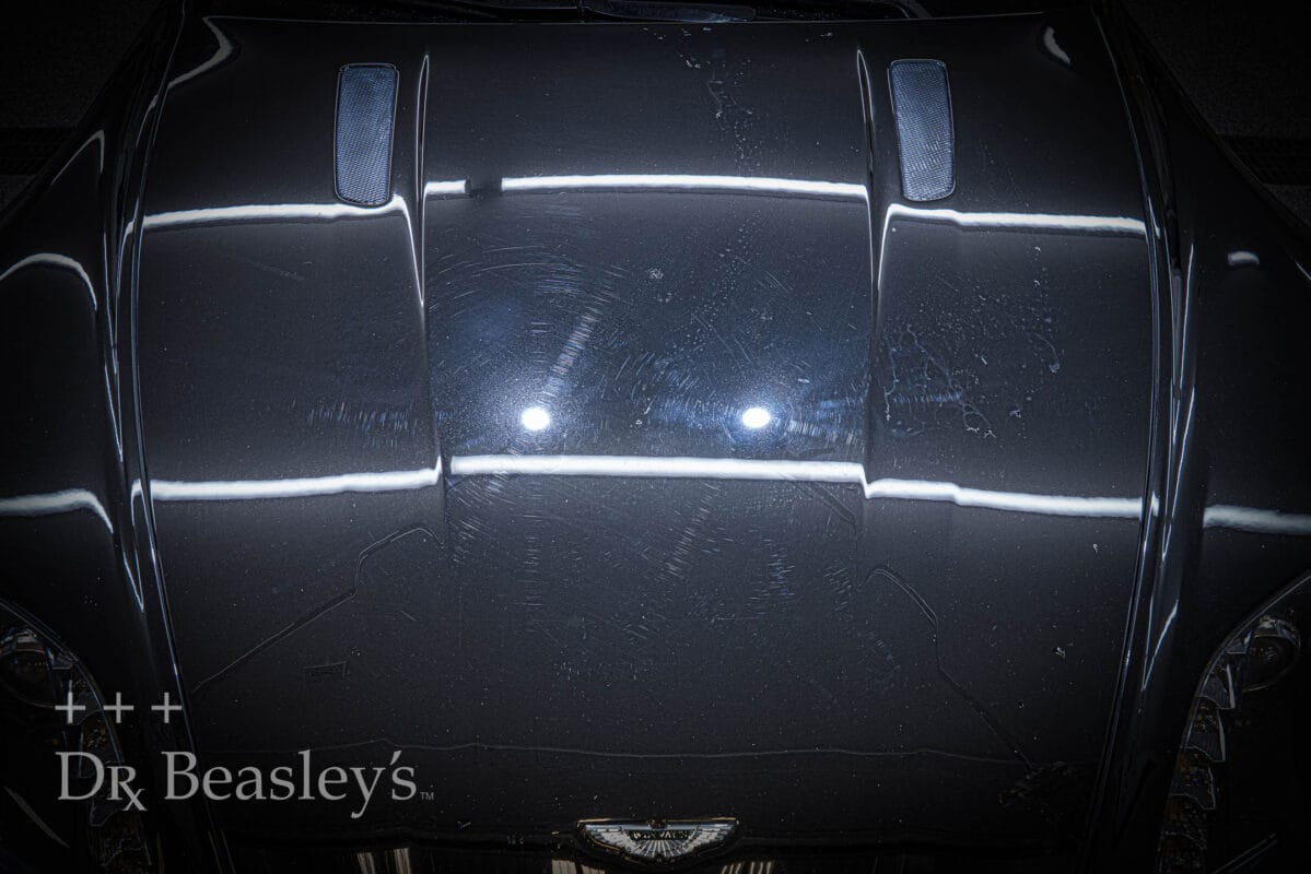 Automotive paint displaying the common "swirling" micro-scratch pattern.