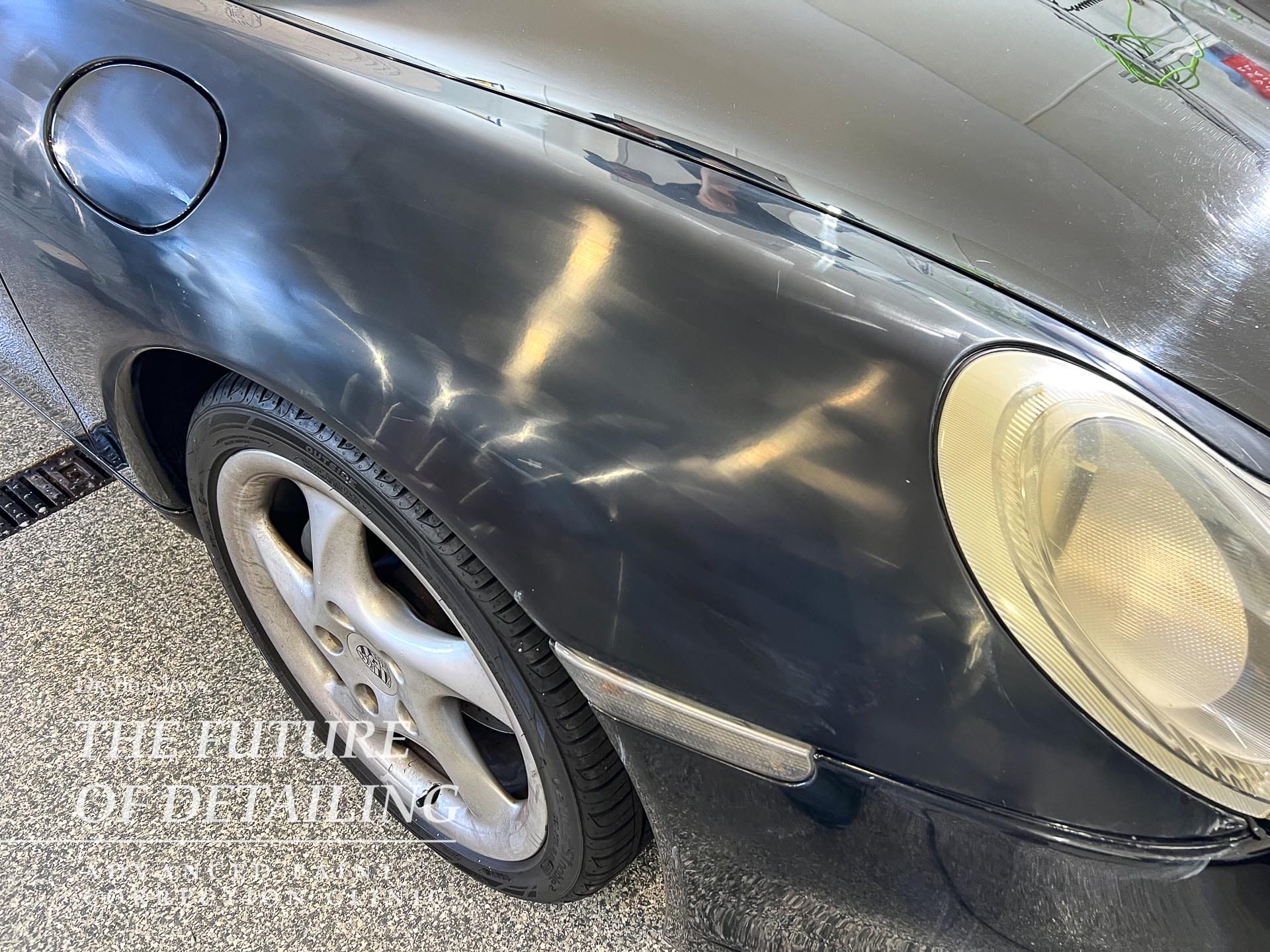 The fender of a Porsche 911 after wet sanding.