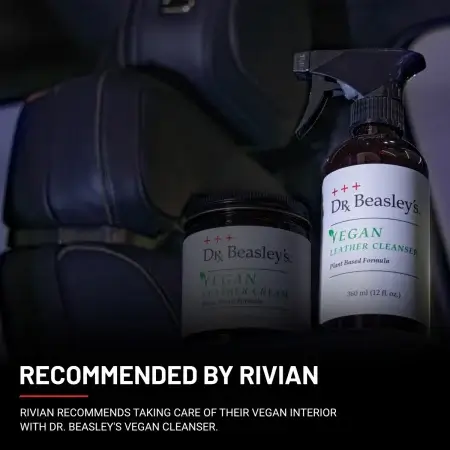 Vegan Leather Cleanser placed inside a black vegan leather Rivian interior. Accompanying text explains that the Vegan Leather Cleanser is recommended by Rivian.