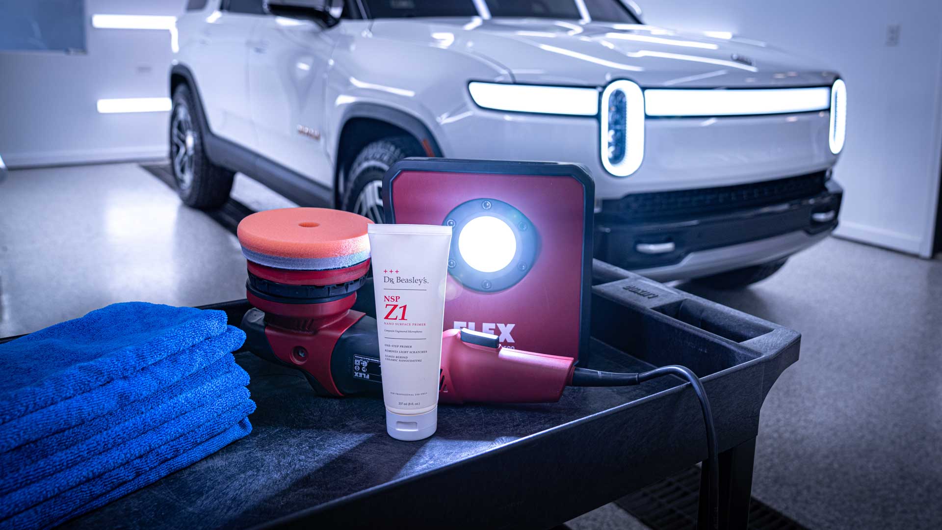 Dr. Beasley's NSP Z1 pictured in front of a 2022 Rivian RS1 Launch Edition.