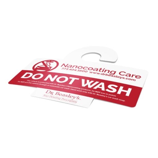 Placard hanger for rearview mirror that reads "Do Not Wash"