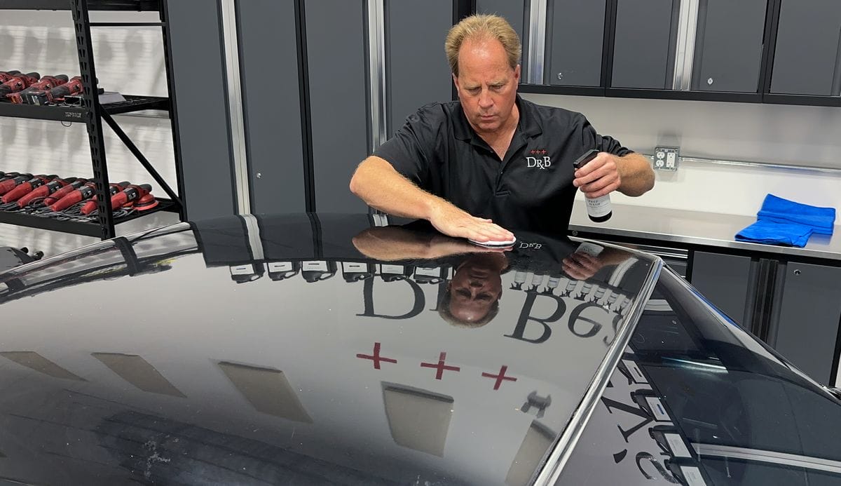Decontaminating car paint with a clay bar