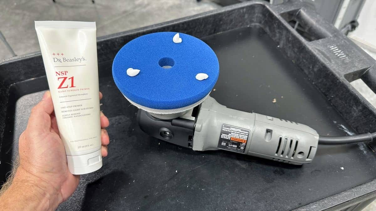 Applying polish to a polishing pad to remove water spots