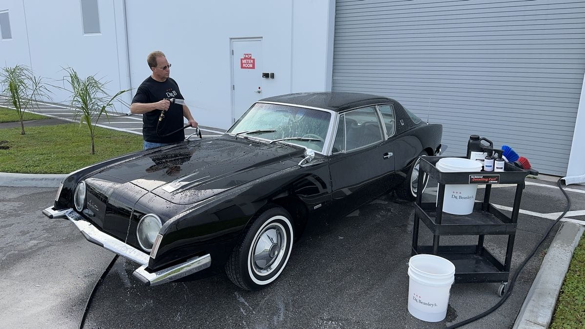 Rinsing black car