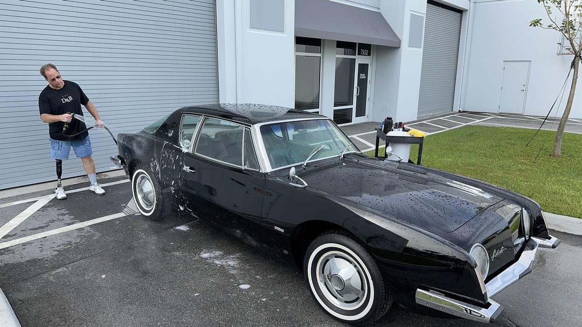 Rinsing black car