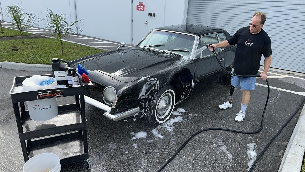 Rinsing black car