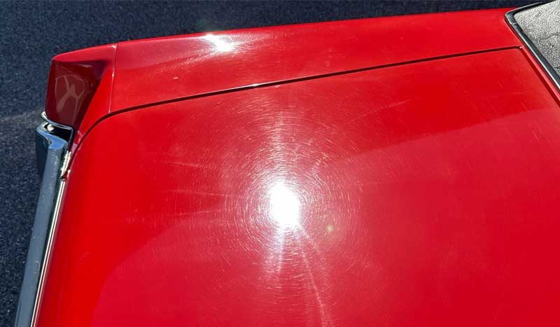 Swirls and holograms on red single stage paint