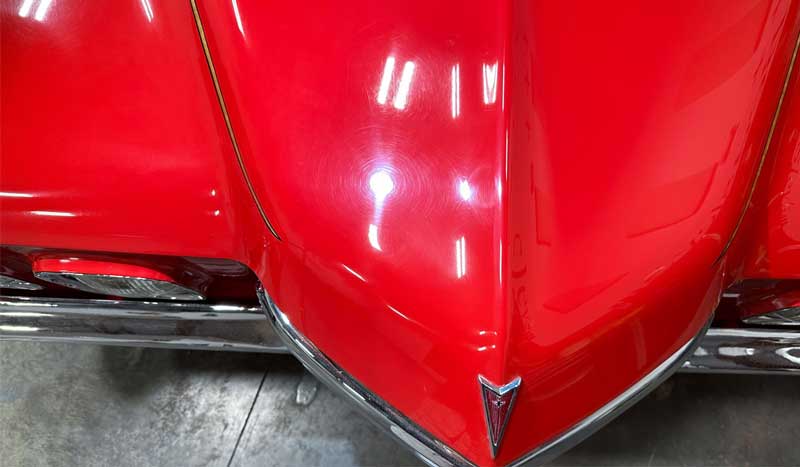 Swirls and holograms on red single stage paint