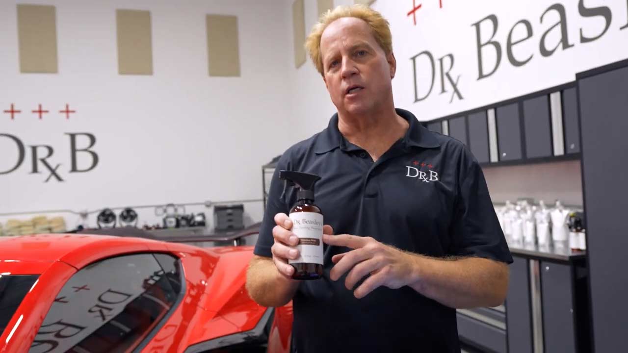 Mike Phillips pointing to Dr. Beasley's Waterless Wash