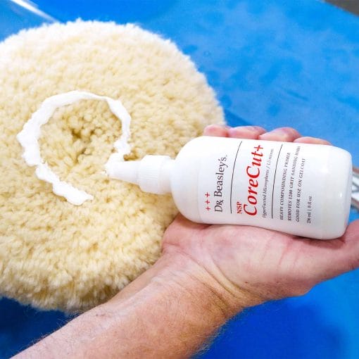 Dispensing CoreCut+ onto wool pad