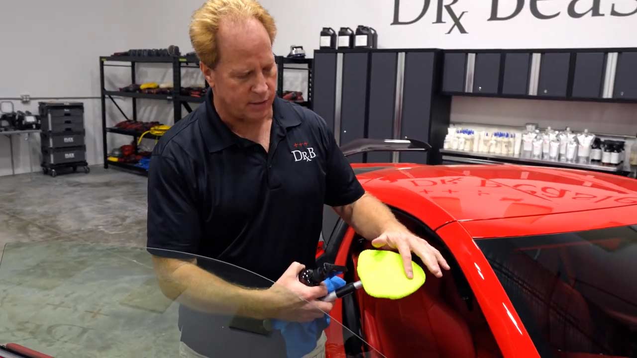 Pad on glass cleaning tool