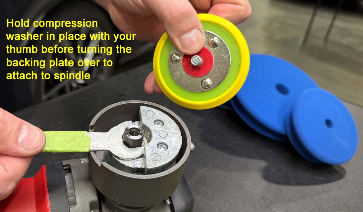 Holding compression washer in place