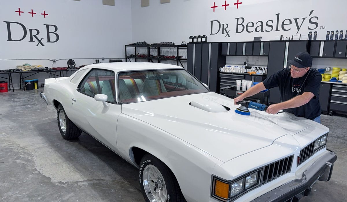 Buffing white Pontiac car