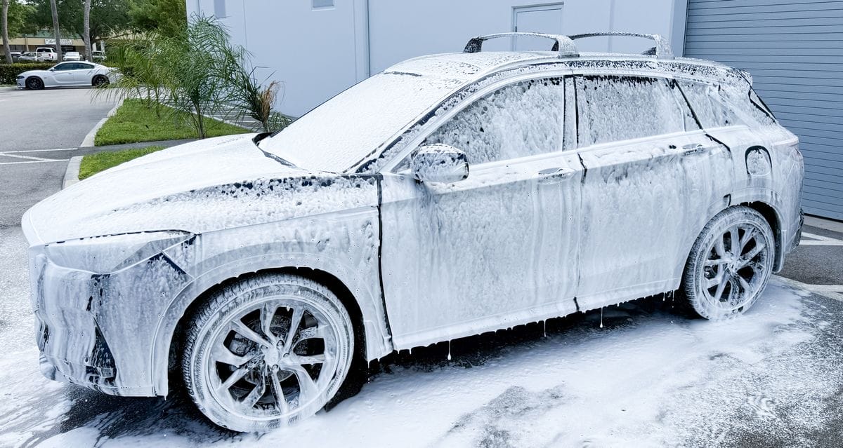 Washing car with foam cannon