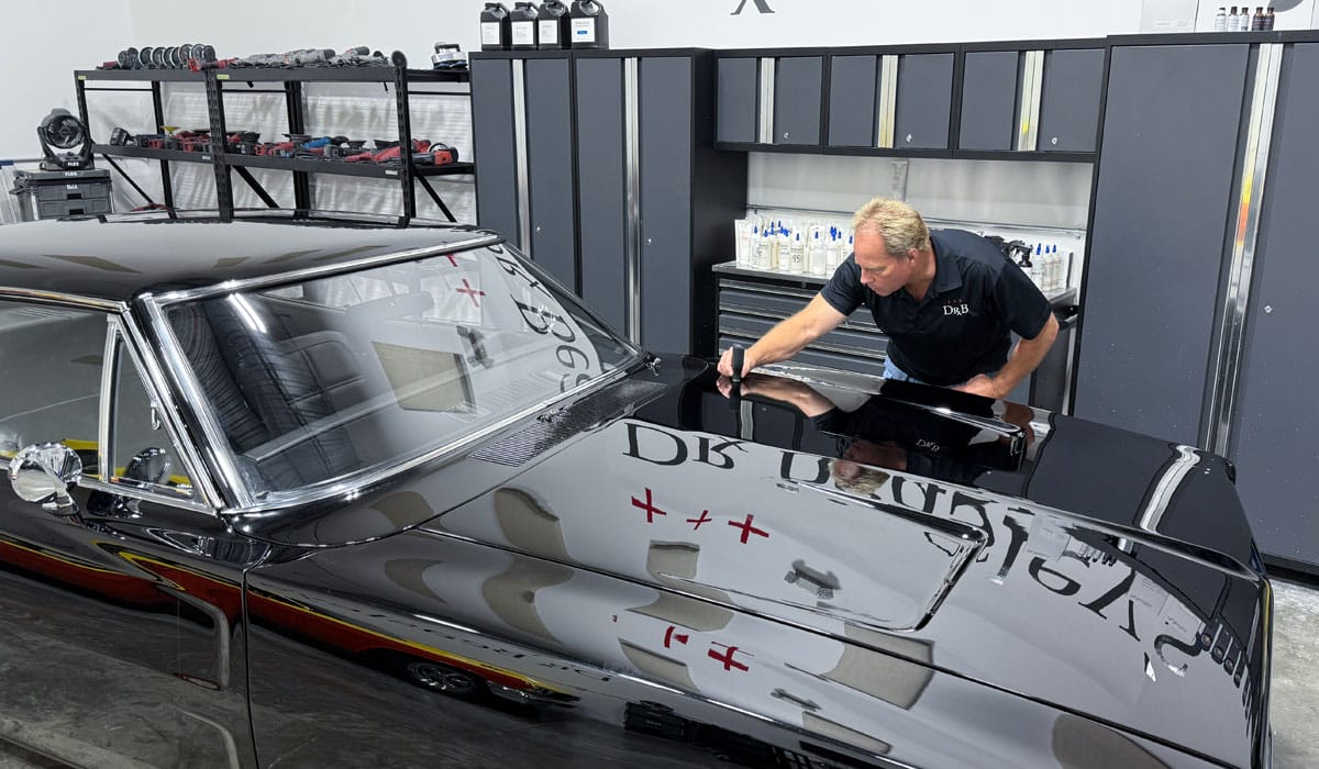 Measuring paint thickness on a 1969 Dodge Charger SRT