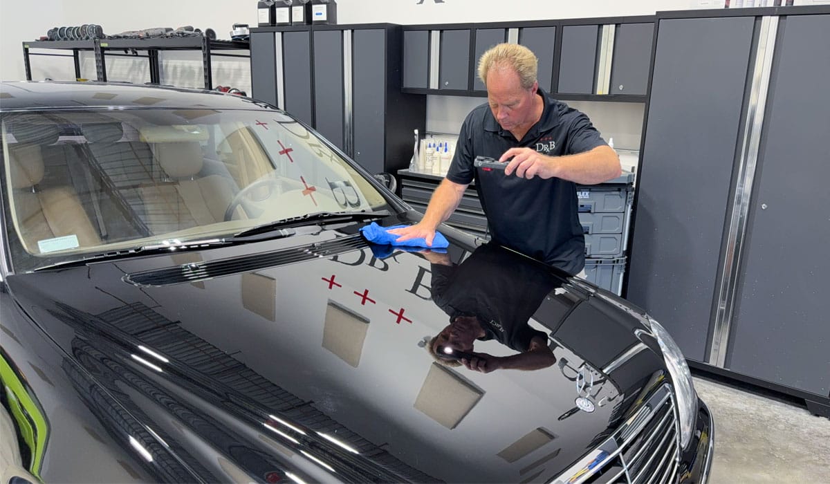 Using strong handheld inspection light to check paintwork correction results