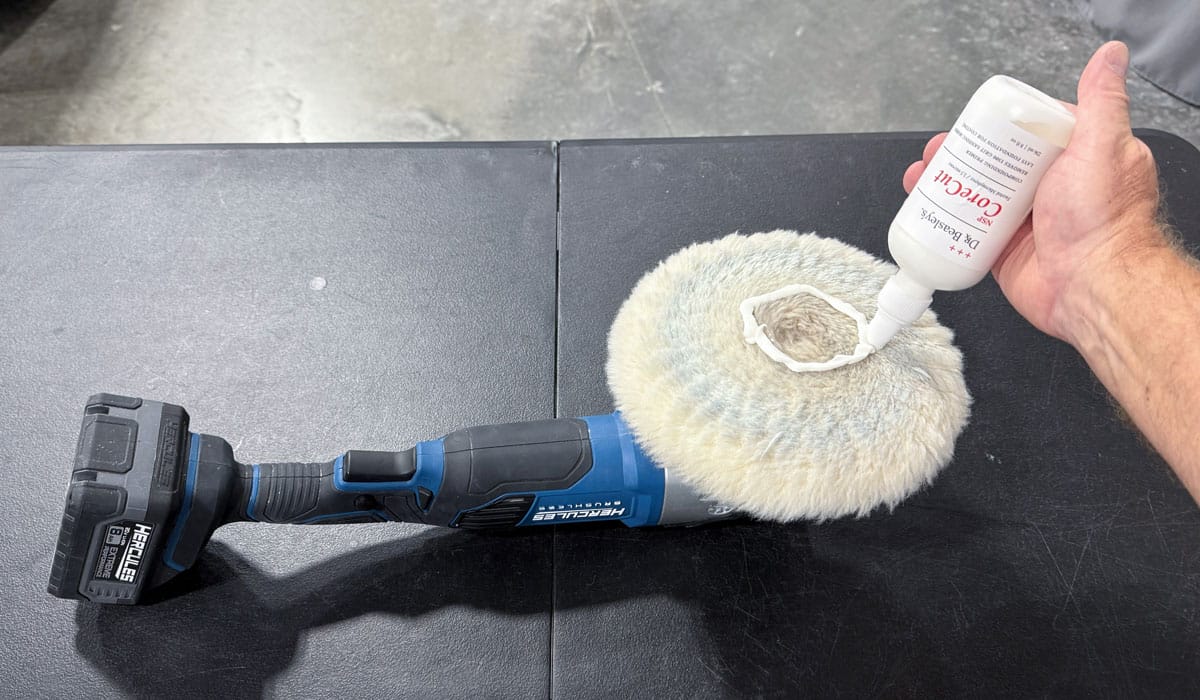 Applying compound to wool buffing pad