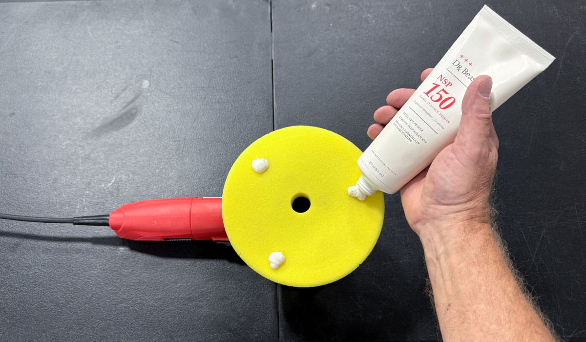 Applying polish to foam buffing pad