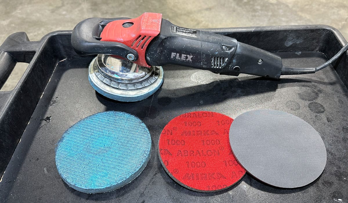 Gear-driven orbital polisher with sanding discs