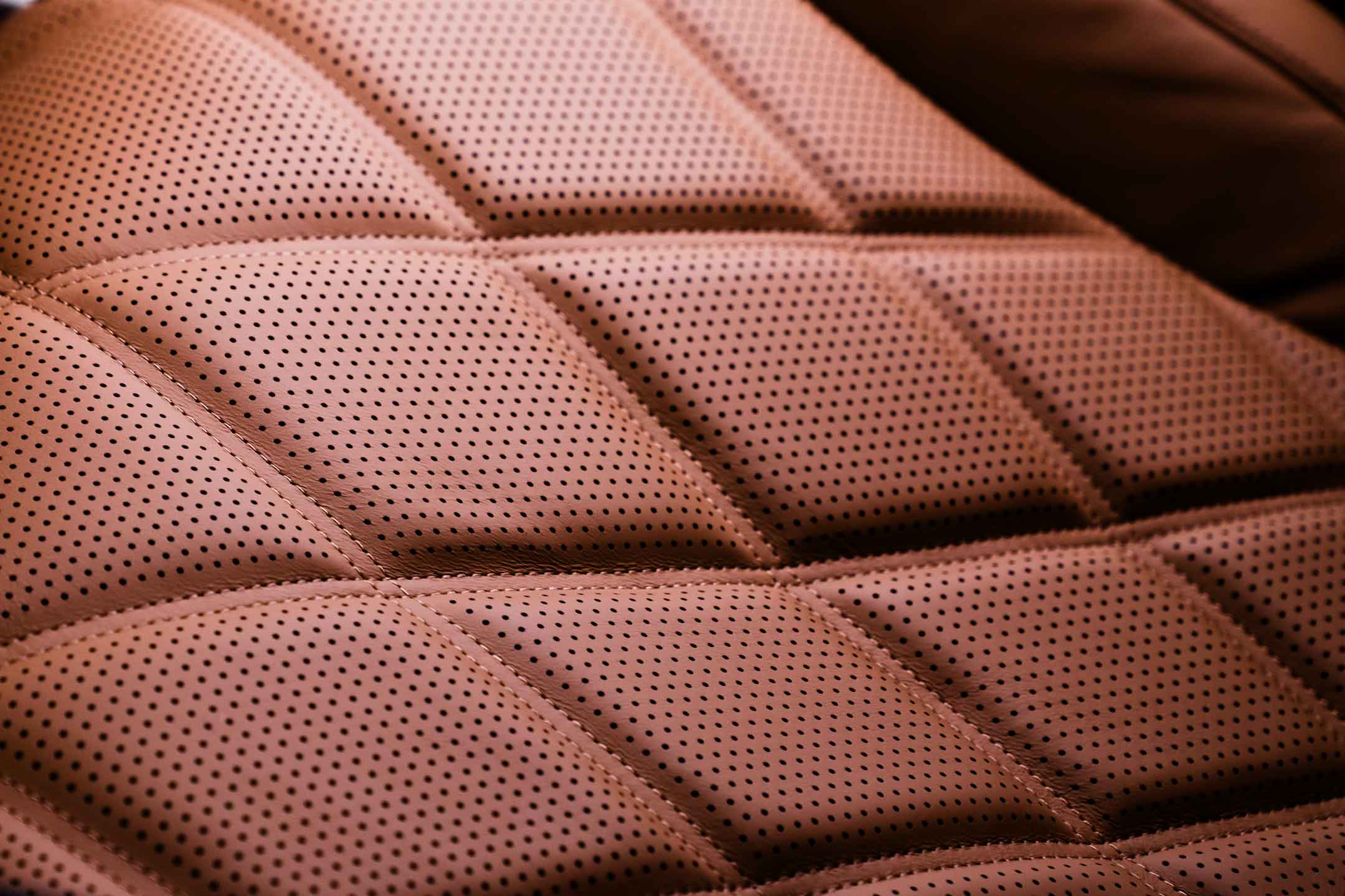 Perforated leather seats