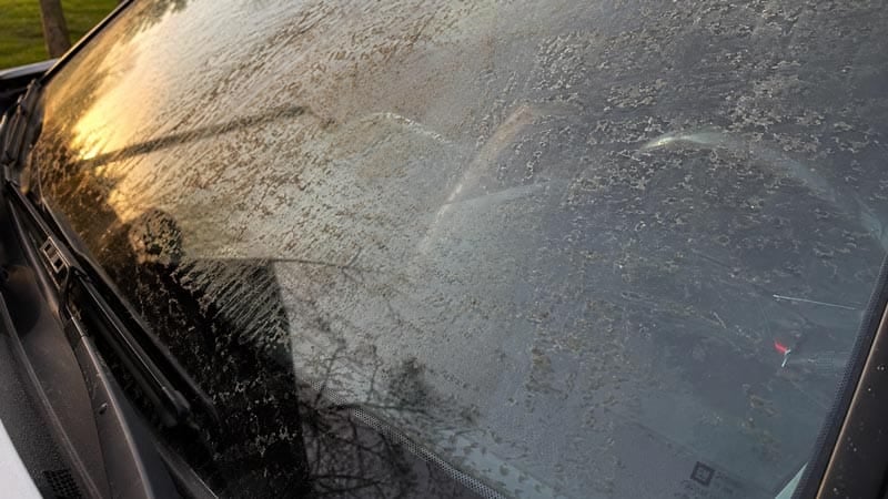 Residue film bonded to glass