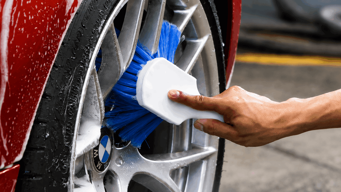 cleaning car wheel with flagged tip brush