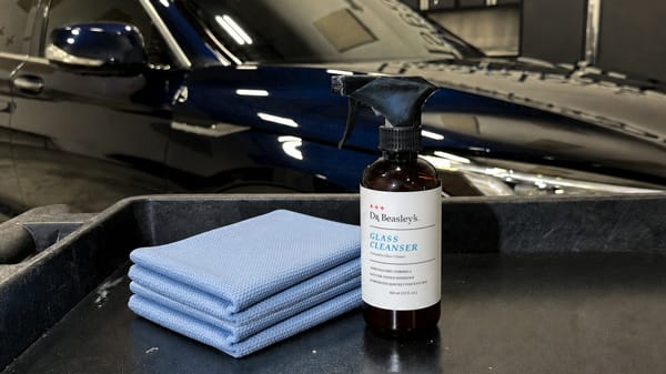 Two glass towels and glass cleaner